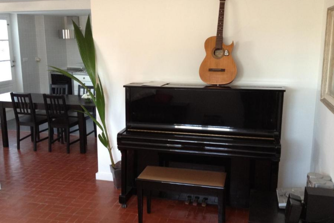 Music corner in the open living room of the AirPorto Hostel